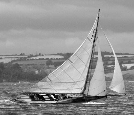 Cork harbor one design sailboat under sail