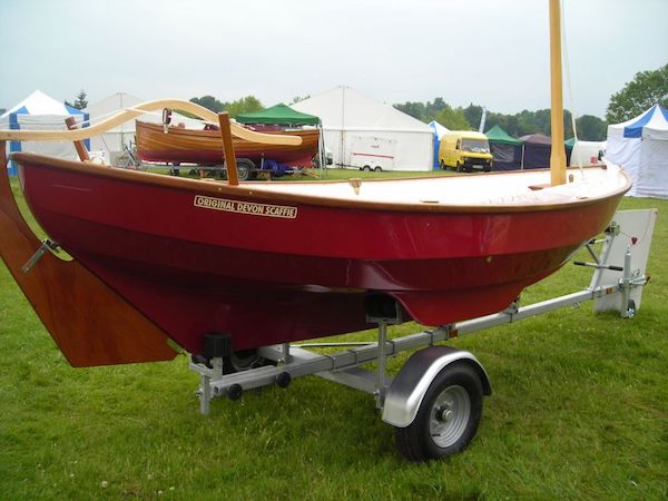 Drascombe scaffie sailboat under sail