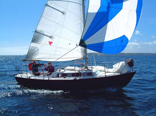 Achilles 24 sailboat under sail
