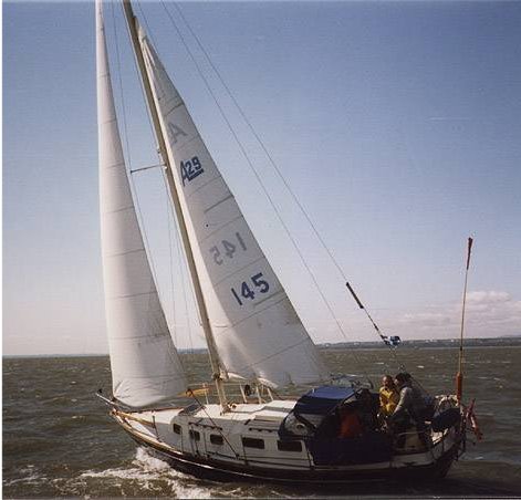 Alberg 29 sailboat under sail