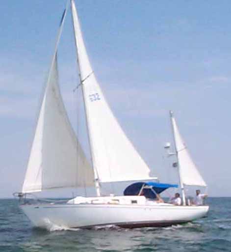 Arco 33 sailboat under sail