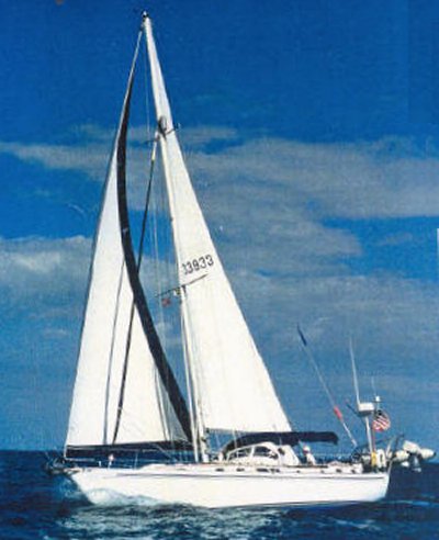 Brewer 128 sailboat under sail