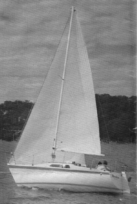 Cole 23 sailboat under sail