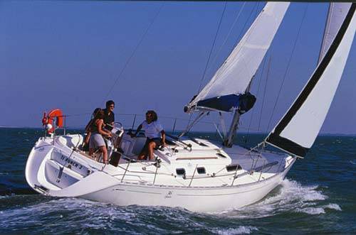 Dufour classic 36 sailboat under sail