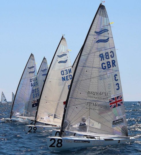 Finn monotype sailboat under sail