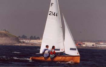 Firefly sailboat under sail