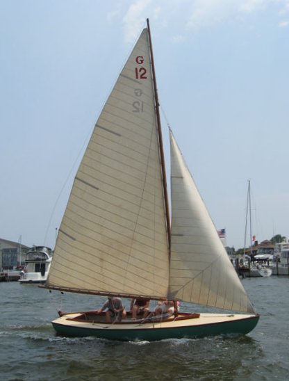 G sloop sailboat under sail