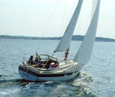 Hallberg rassy 31 sailboat under sail