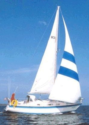 Hughes 31 sailboat under sail