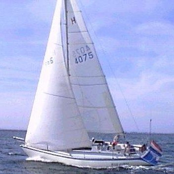 Hustler 32 sailboat under sail