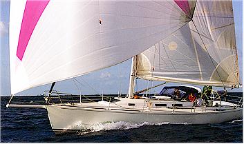 J130 sailboat under sail
