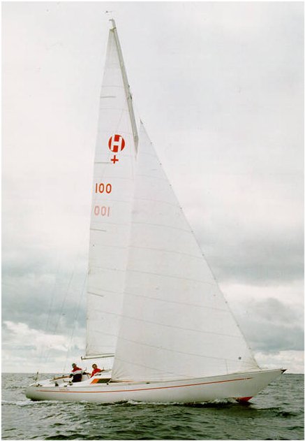 Lady helmsman sailboat under sail