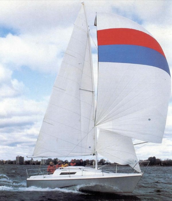 Laser 28 sailboat under sail