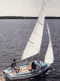 Leeward 16 luger sailboat under sail