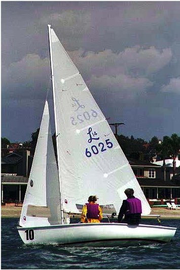 Lido 14 sailboat under sail