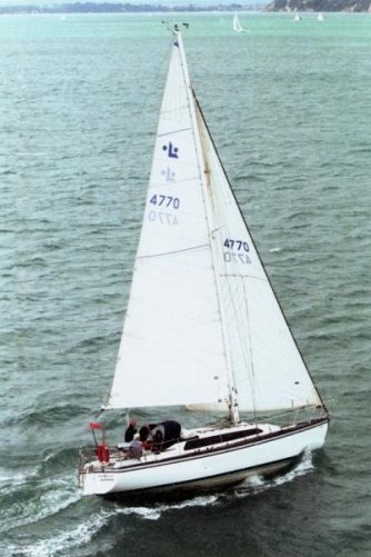 Lotus 106 sailboat under sail