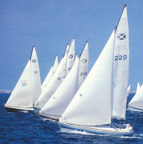 Maxi racer sailboat under sail