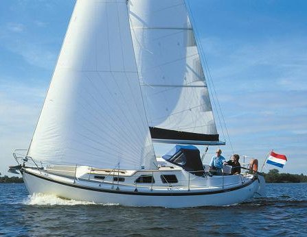 Midget 31 sailboat under sail