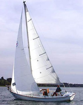 Olympic star sailboat under sail