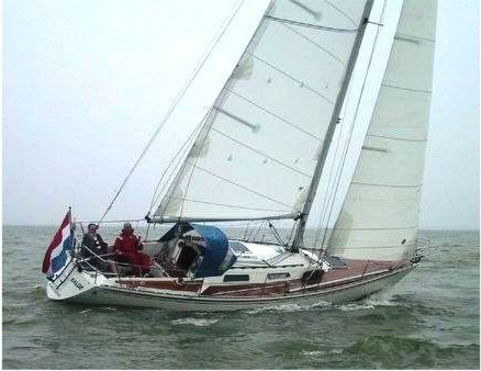 Omega 34 sailboat under sail