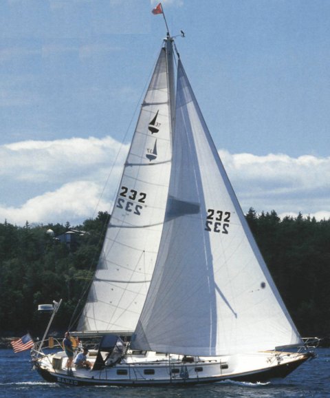 Pacific seacraft 37 sailboat under sail