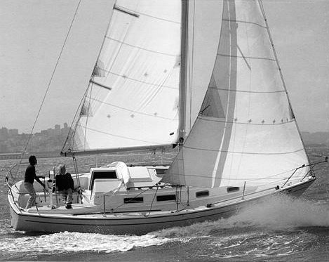 Pearson 303 sailboat under sail