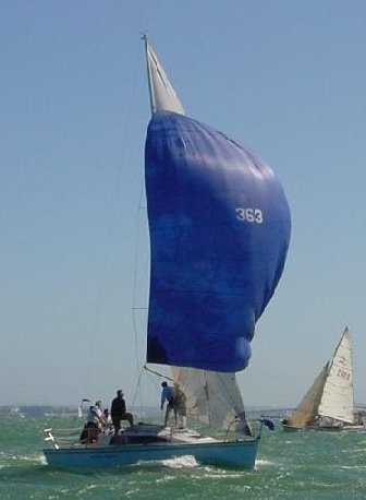 Ross 930 sailboat under sail