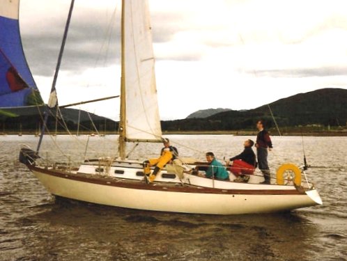 Thompson 31 sailboat under sail