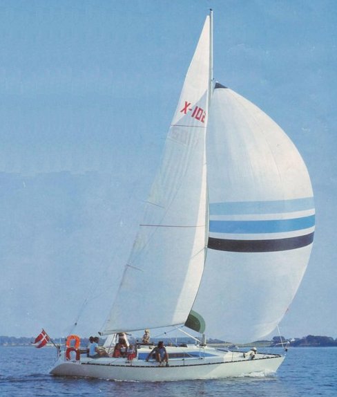 X 102 sailboat under sail