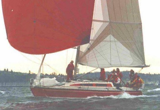 X 119 sailboat under sail